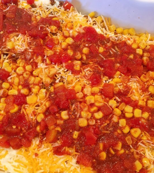 Repeating the layers on the Mexican Casserole. 