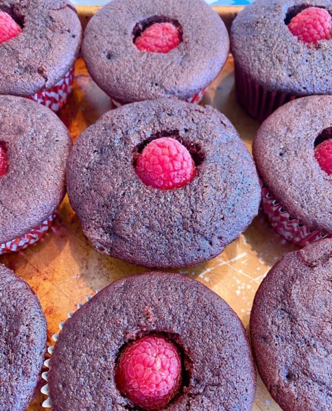 Fresh Raspberry in the center of each cupcake. 