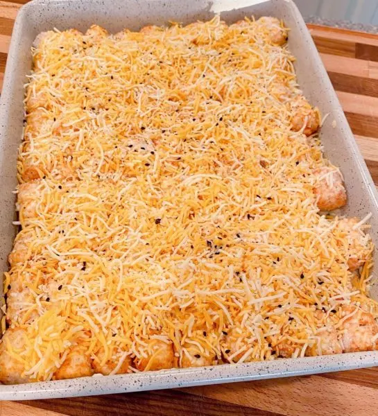 Topping Casserole with grated cheese