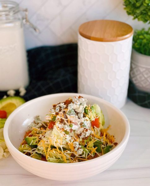 Classic Wedge Salad with Blue Cheese Dressing in a bowl 