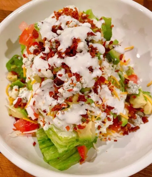 Classic Wedge Salad with Homemade Blue Cheese ready to serve