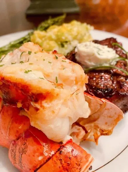 Air Fryer Lobster on a plate with a filet mignon.