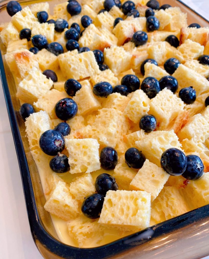 Batter added to bread cubes and blueberries.