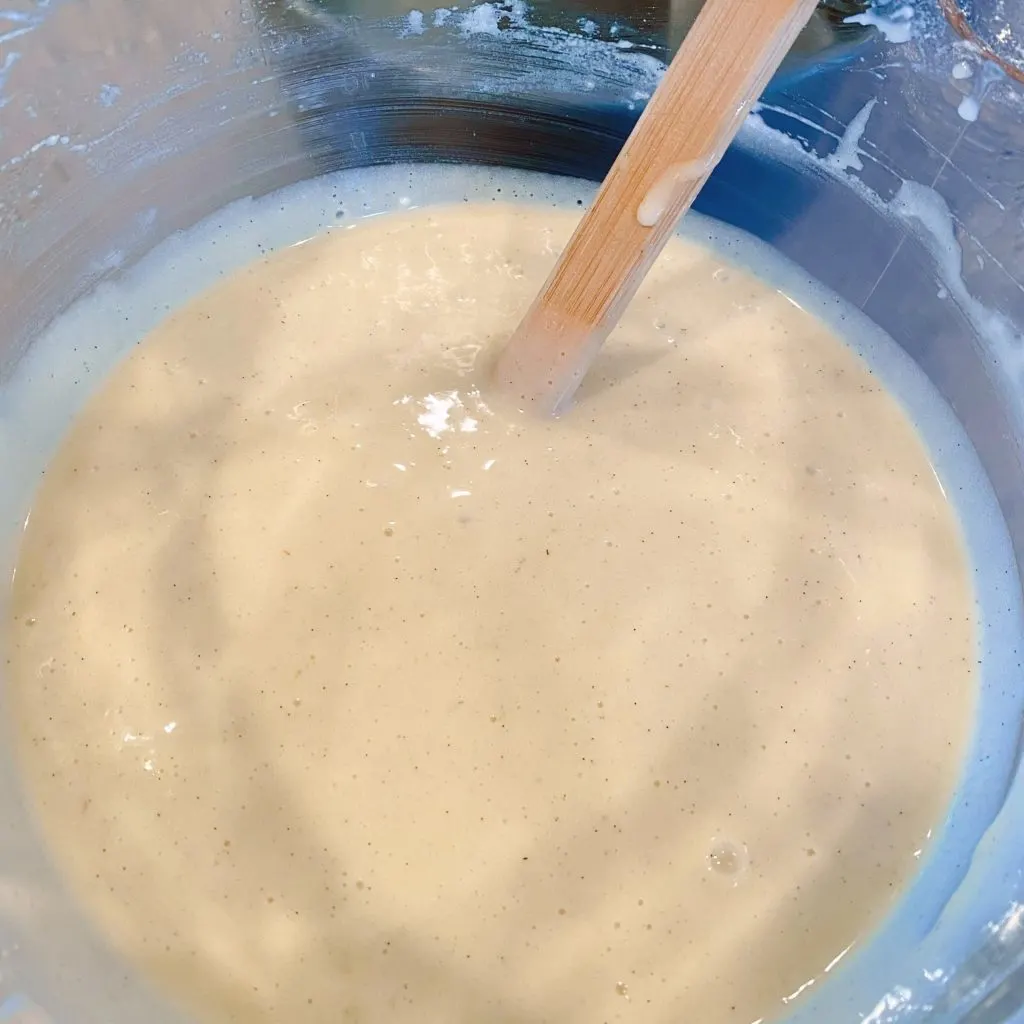 Vanilla Cake Batter in mixing bowl all the ingredients combined.