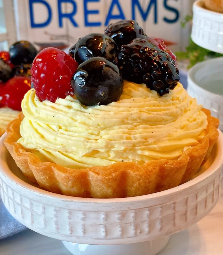 Fresh Fruit Mini Tartlet on a cupcake stand.