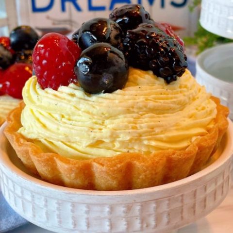 Fresh Fruit Mini Tartlet on a cupcake stand.