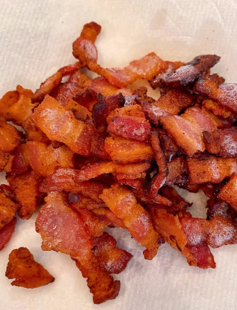 Bacon on a paper towel lined plate.