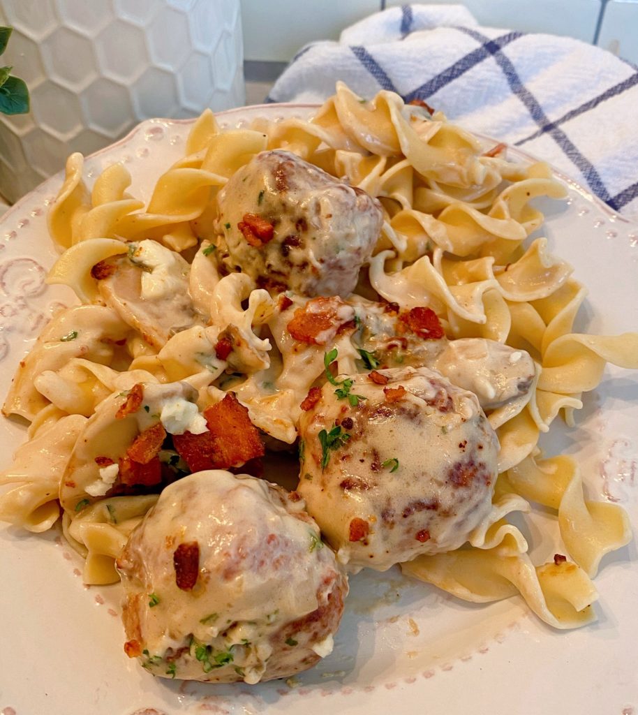 Creamy Meatballs on a dinner plate.