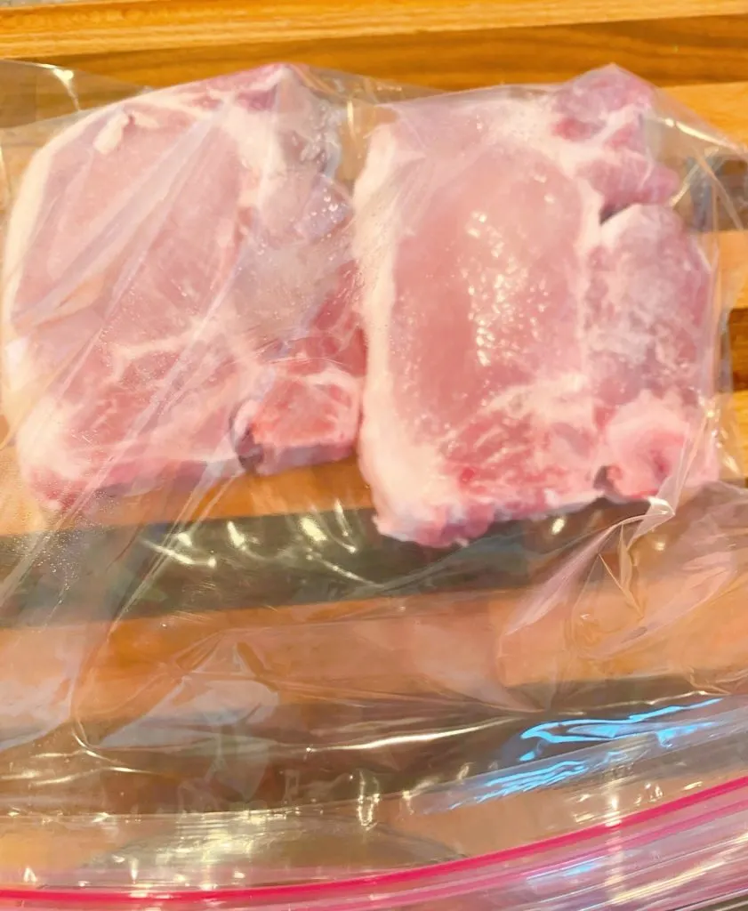 Pork Chops in a ziploc bag ready for marinade.