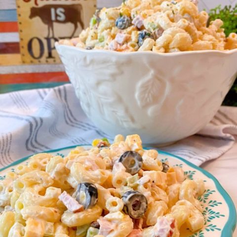 Creamy Summer Pasta Salad in a serving bowl and on a plate.