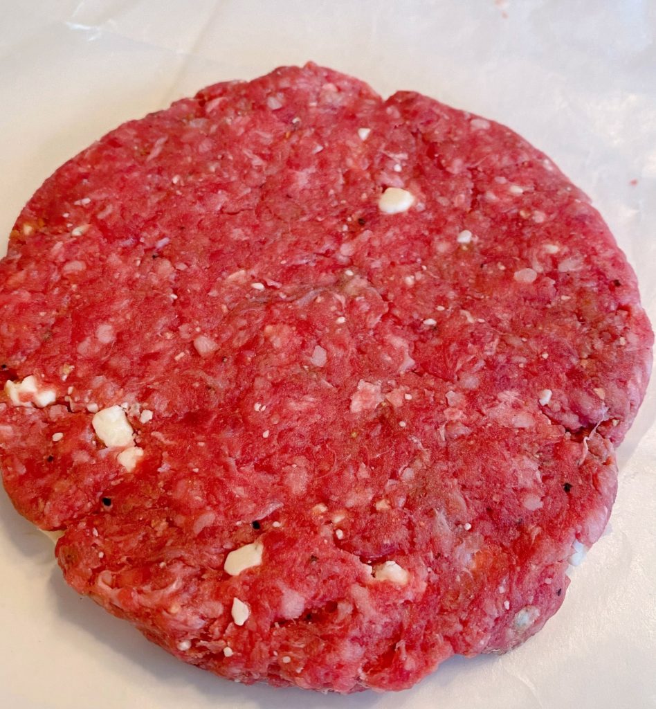 Forming burgers into patties. 