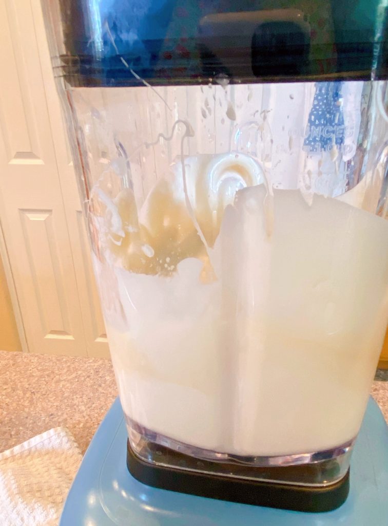 Creamy cream cheese pie filling in a blender.