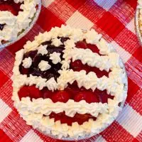 No Bake Cheesecake on a red checked cloth.