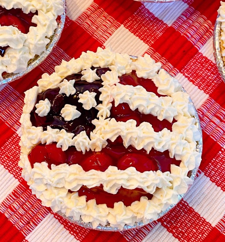 No Bake Cheesecake on a red checked cloth.