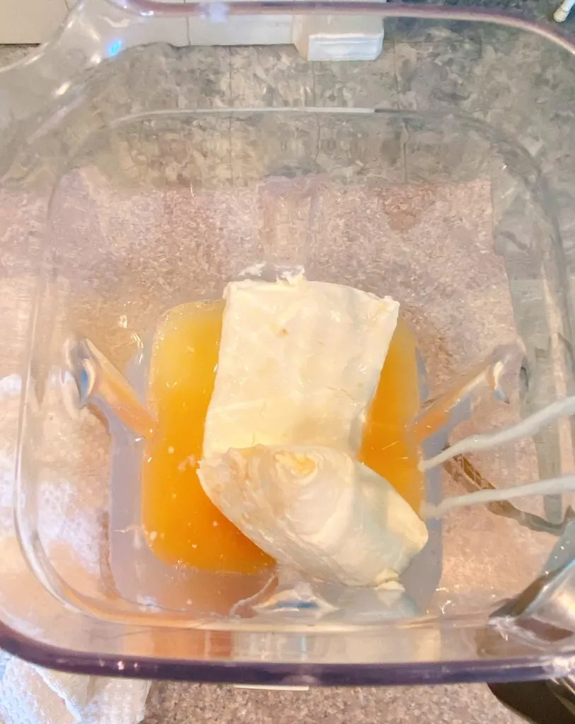 cream cheese, lemon juice, vanilla and and sweetened condensed milk in a blender.
