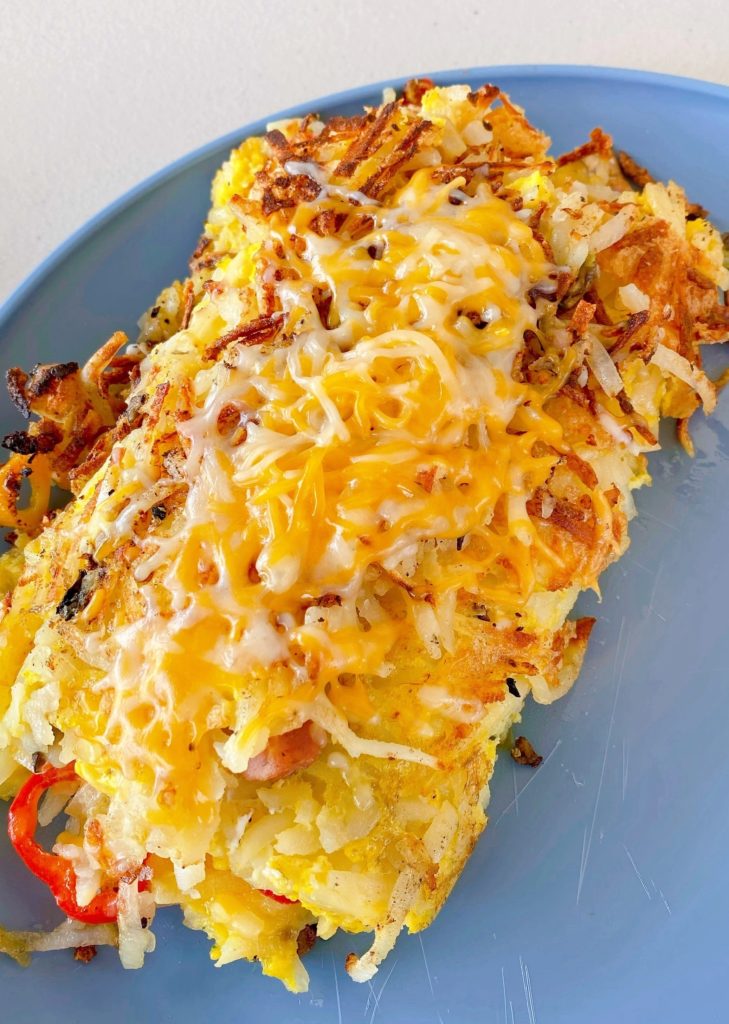 Grilled Hash Brown Omelets on a blue plate. 