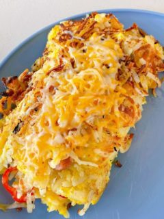 Grilled Hash Brown Omelets on a blue plate.