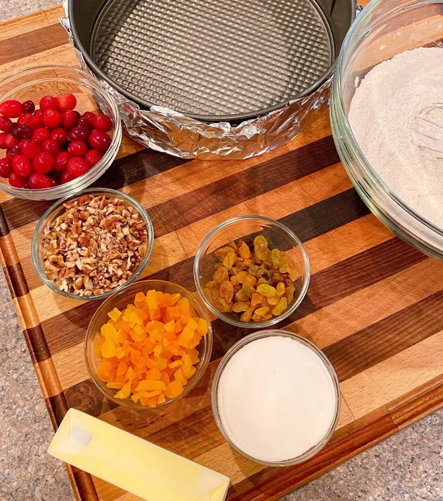 All the cake ingredients prepped for baking on a cutting board.