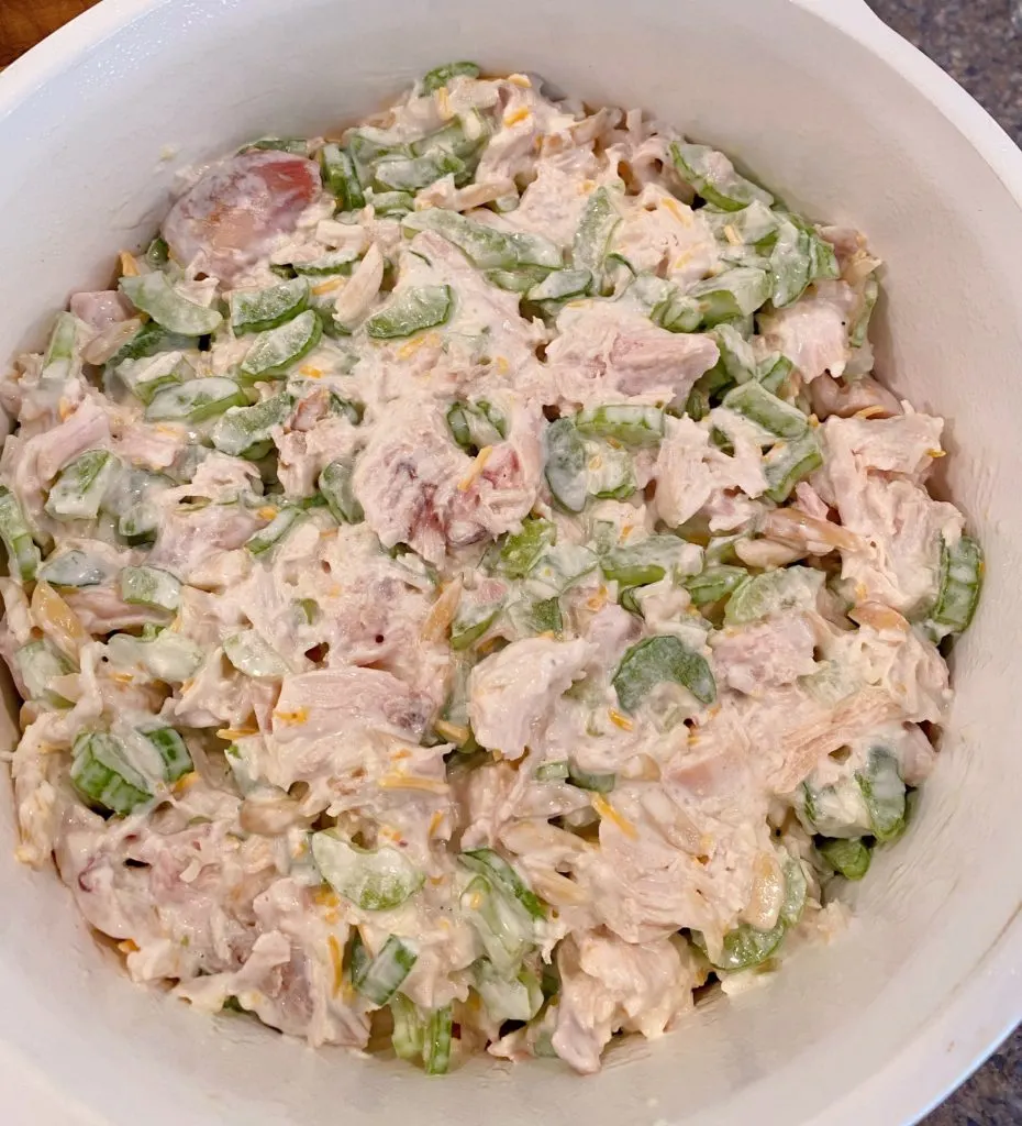 Hot Chicken Chip ingredients mixed together and in a baking dish.