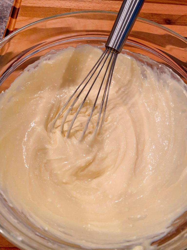 Cream Cheese filling smooth and creamy in a mixing bowl.