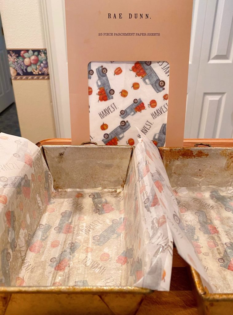 Bread Pans lined with cute Fall parchment paper ready for bread mix.