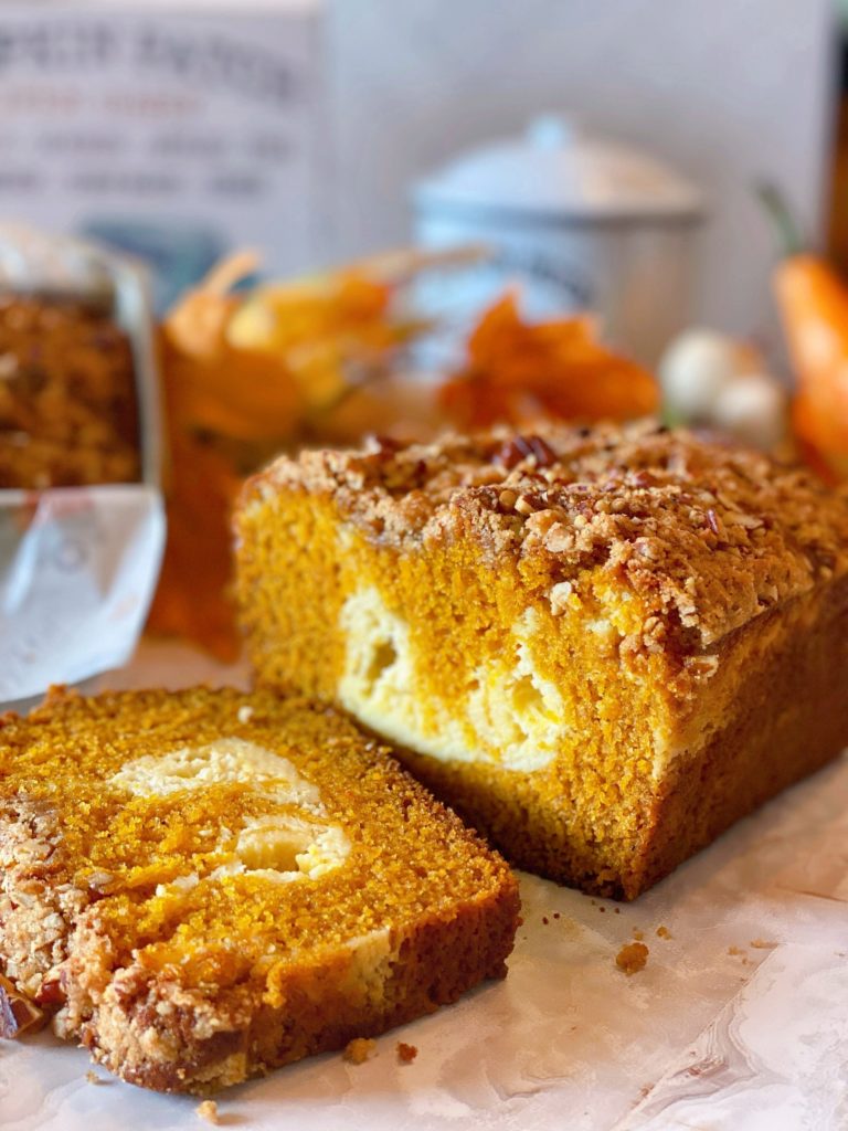 Pumpkin Cream Cheese Streusel Topping sliced on a kitchen counter.