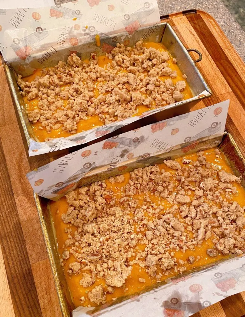 Each loaf of pumpkin bread topped with streusel topping. 