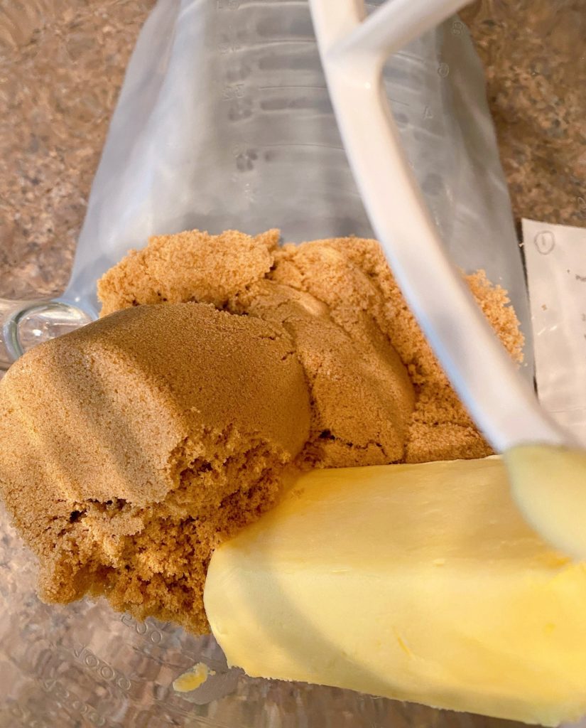 Brown sugar and butter flavored shortening in the bowl of mixer.