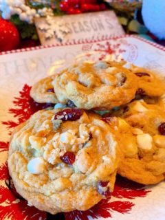 Christmas plate loaded with Cranberry White Chocolate Chip Cookies.