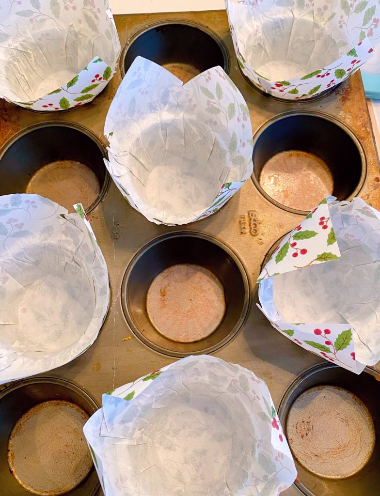 Paper liners in a muffin tin.