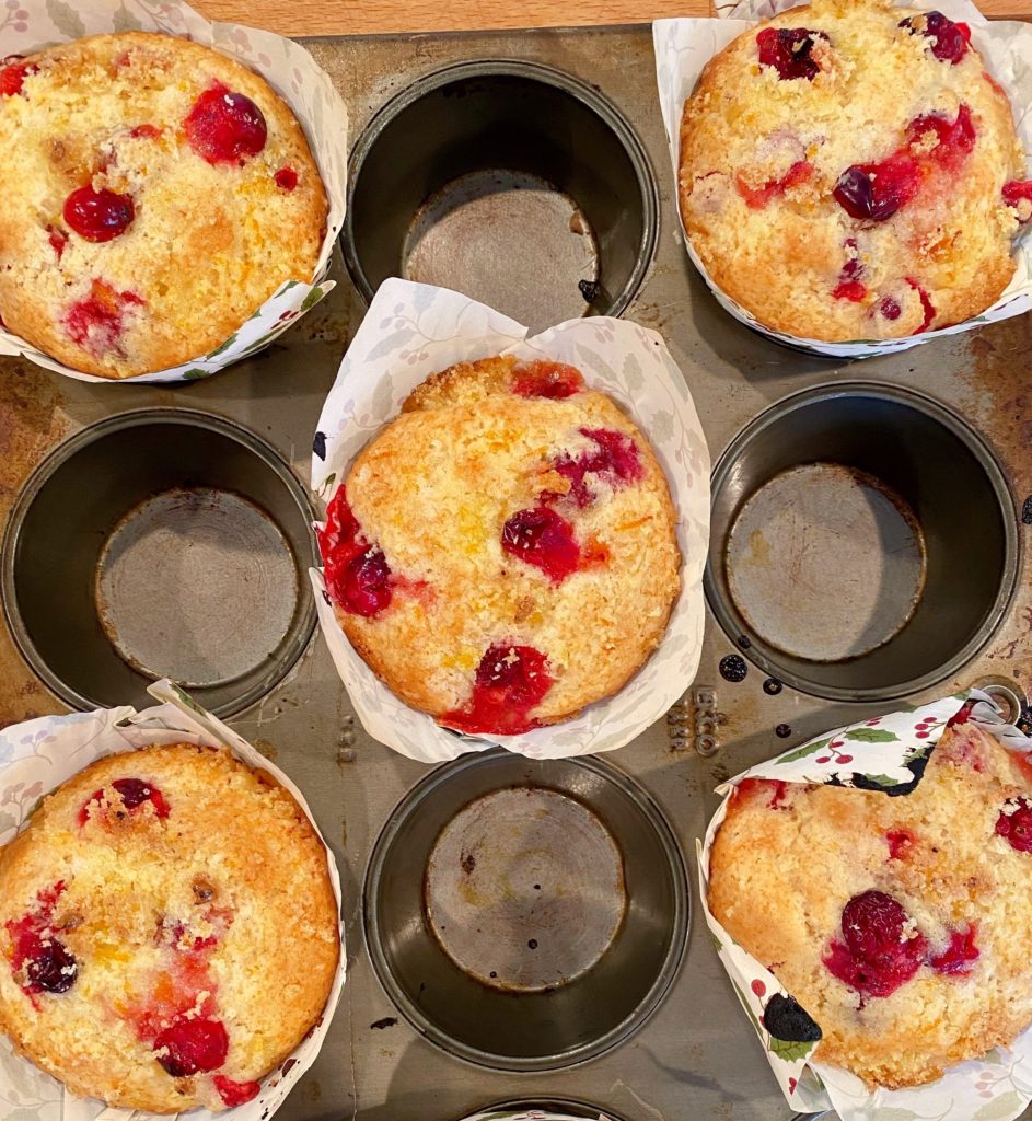 Baked muffins in muffin tin after baking.