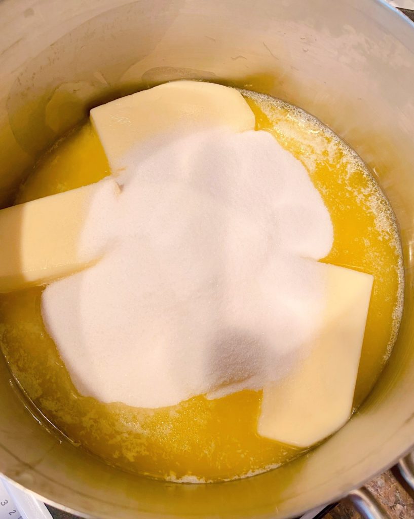Butter and sugar in a heavy medium sauce pan on the stove melting.