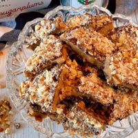 English Toffee Almond Roca in a crystal candy dish .