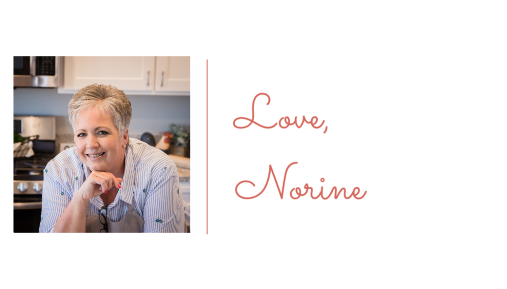 Photo of Norine from Norine's Nest leaning on a kitchen counter.