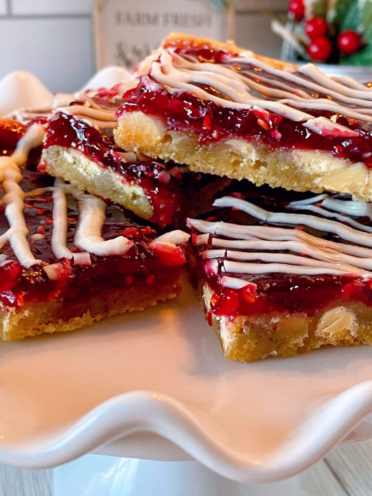 Up close photo of a stack of White Chocolate Raspberry Bars.
