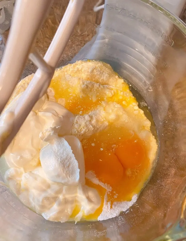 Cake ingredients in mixing bowl waiting to be mixed.