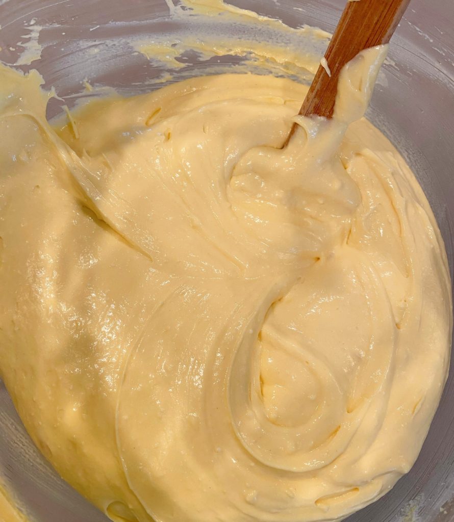 Cake batter in mixing bowl.