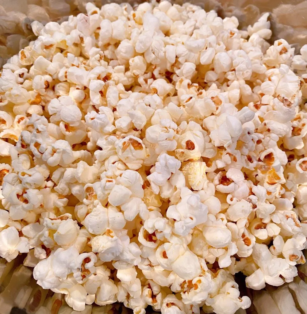 Popped Popcorn in Large Bowl on Counter.