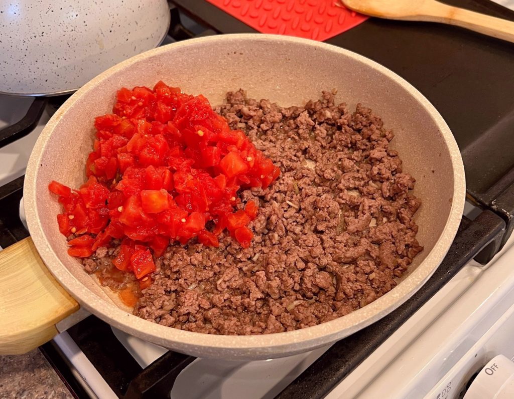 Rotel added to ground beef.