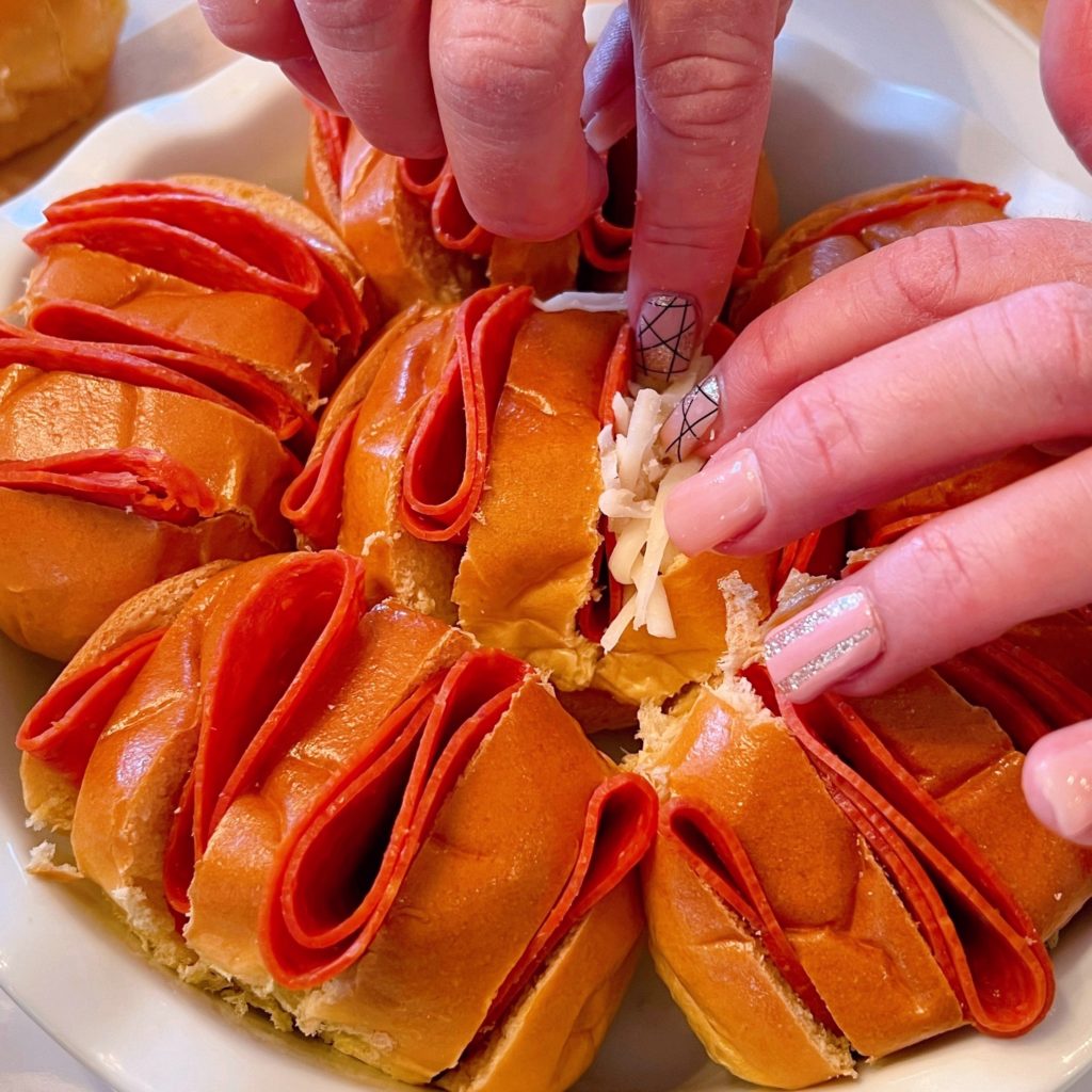 Pepperoni Stuffed into the dinner rolls.