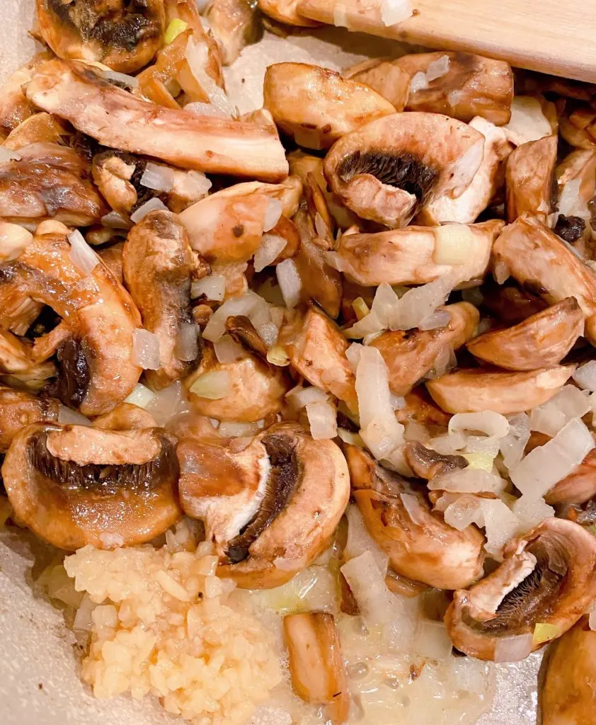Sauteed Mushrooms and Onions in large skillet.