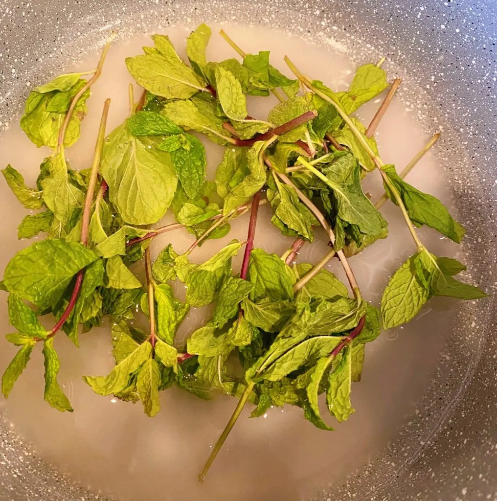 Mint, sugar, and water in medium sauce pan.