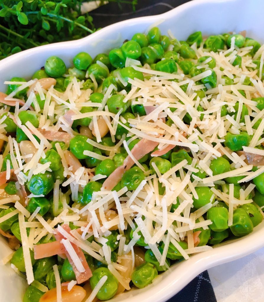 Peas, Prosciutto, and Pine Nuts in serving dish.