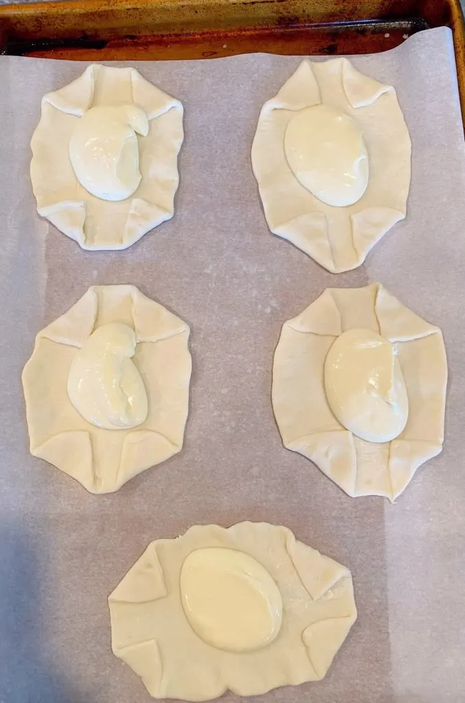 Cream Cheese Filling in the center of each puff pastry square.