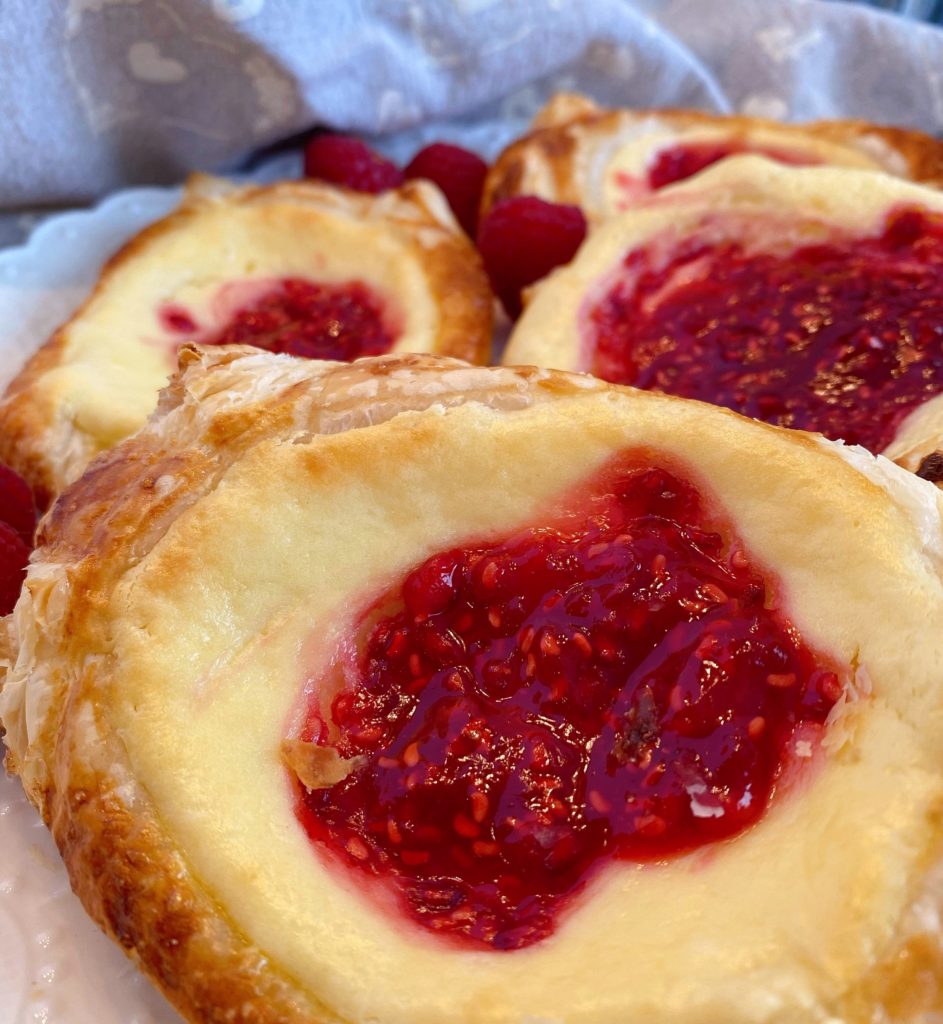 Close-up of one of the Raspberry Danishes on the plate.