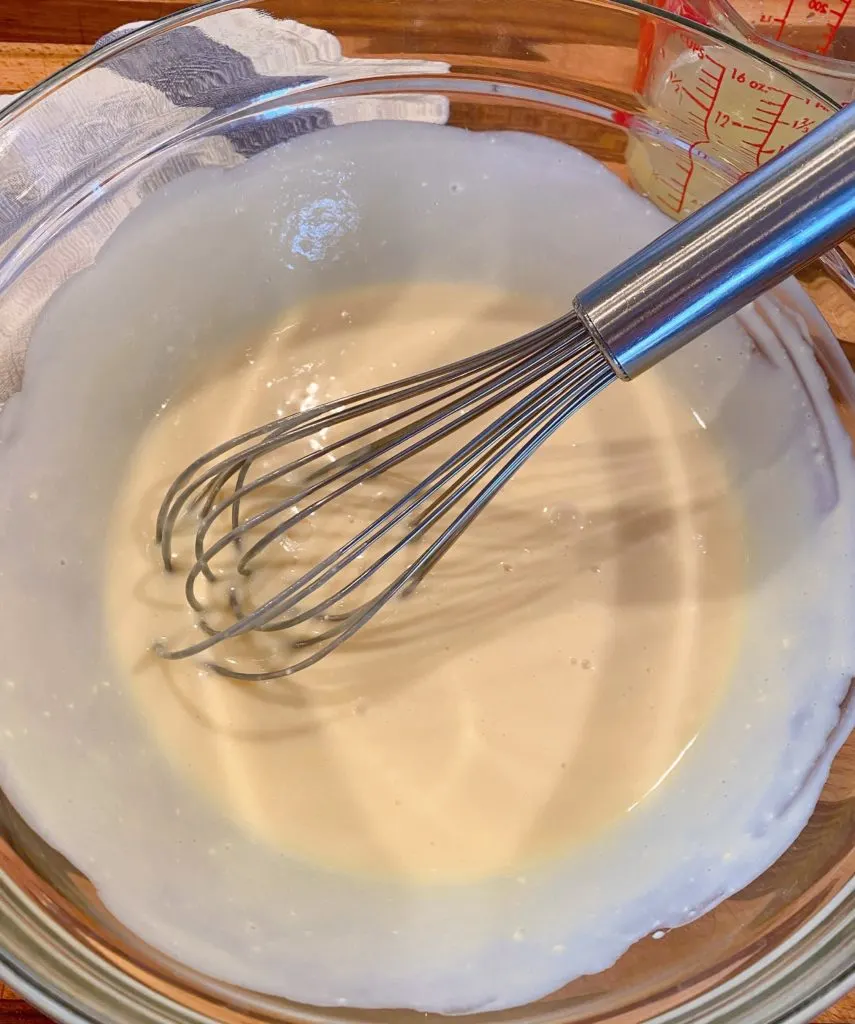 Cream Cheese filling in a large bowl ready to be chilled.