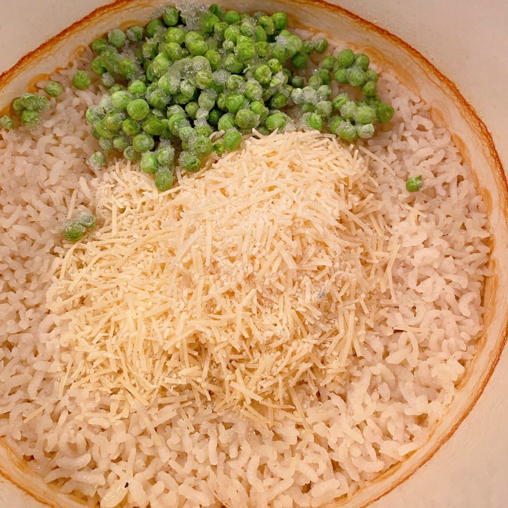 Adding Parmesan Cheese and Peas.