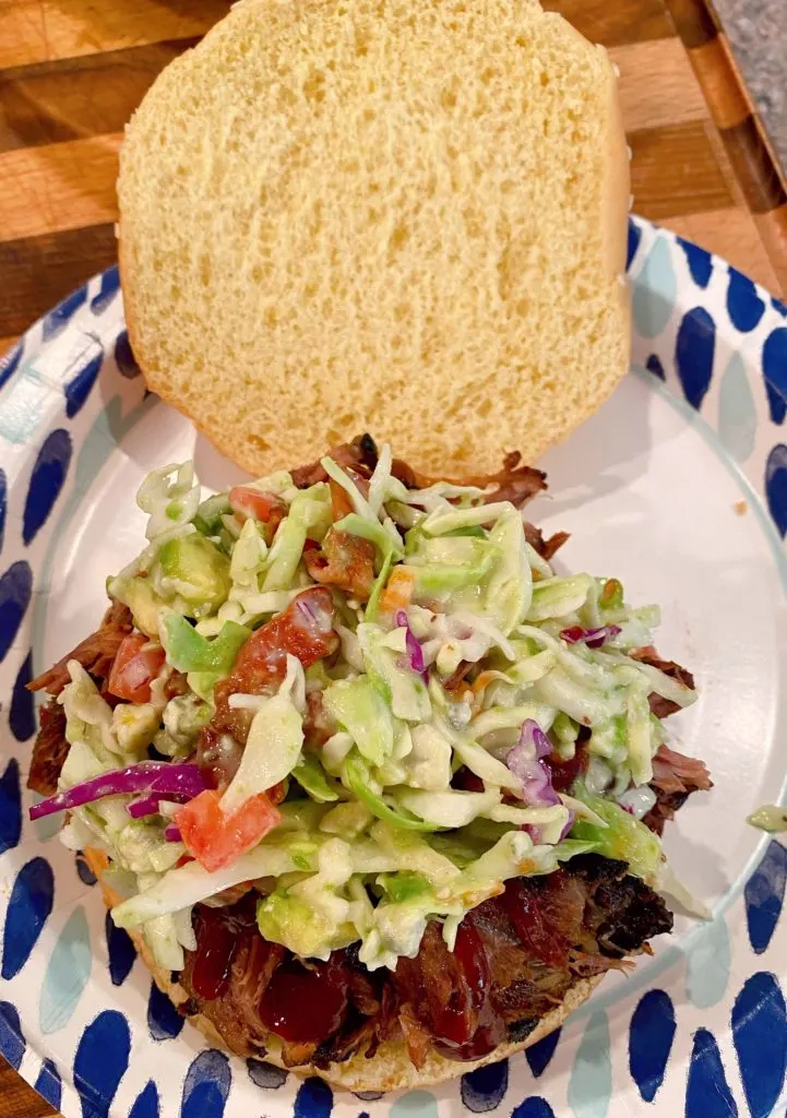 slaw on top of beef short ribs.