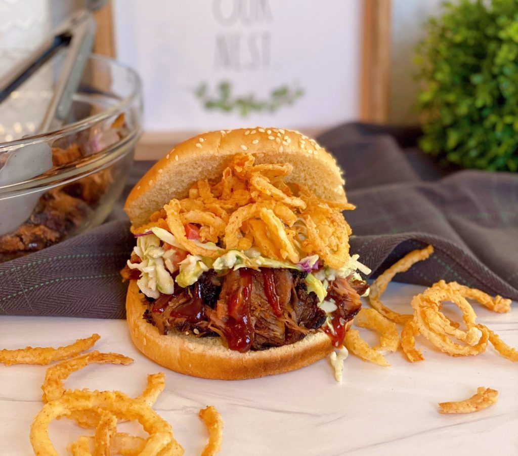 Distant photo of braised bbq short rib sandwich.