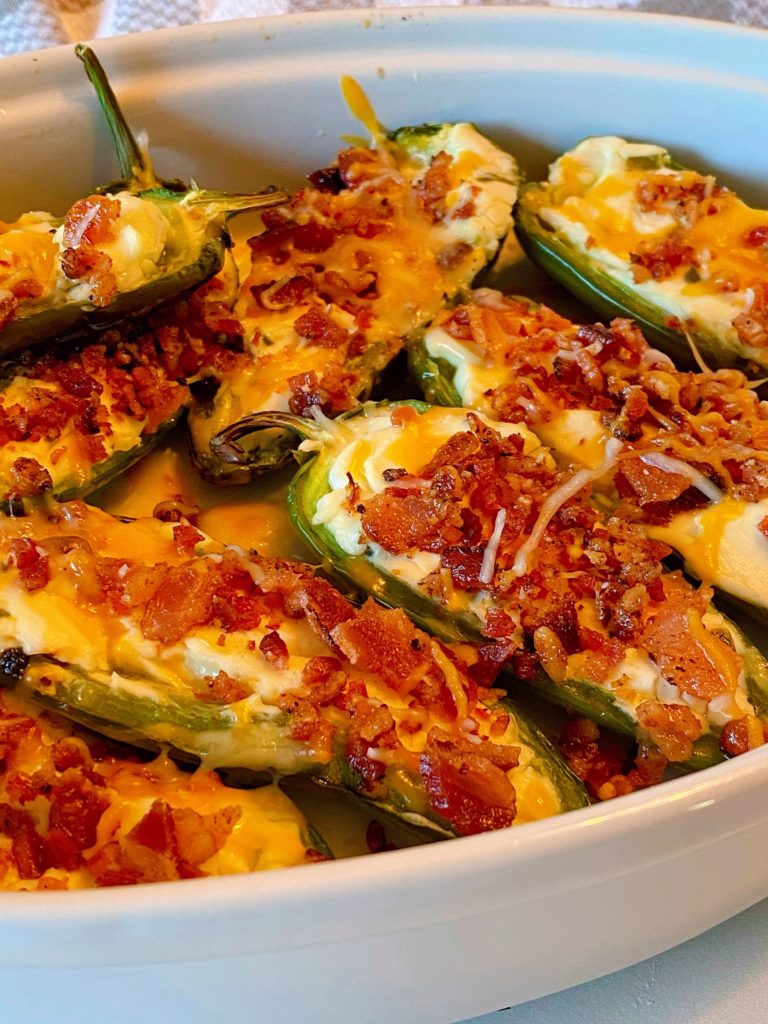 Bacon Stuffed Jalapeno Poppers in baking dish.